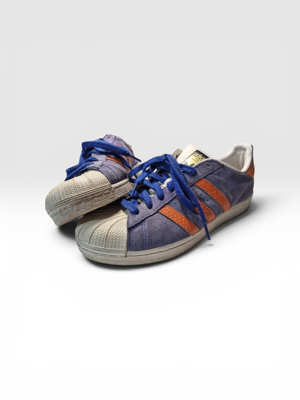 Zapatillas Adidas Superstar Violeta con Naranja