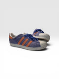Zapatillas Adidas Superstar Violeta con Naranja